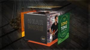 Still from the SonoTone cube animation, where string packaging and slogans rotate and open to reveal musicians performing inside the cube.