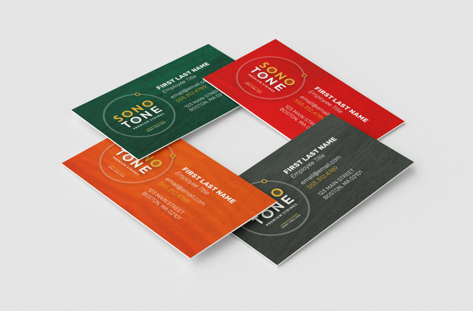 Four SonoTone business cards arranged together, showing the range of guitar-texture backgrounds and translucent palette colorways.