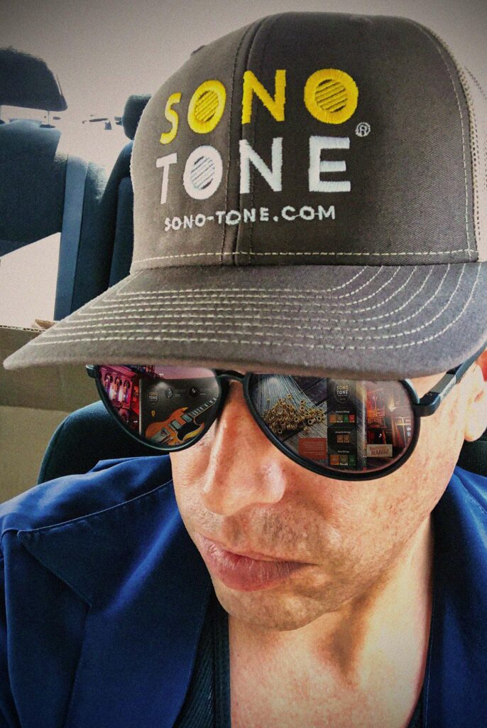 Vintage-style trucker cap with a large embroidered SonoTone logomark, part of the brand's simple, bold apparel line.