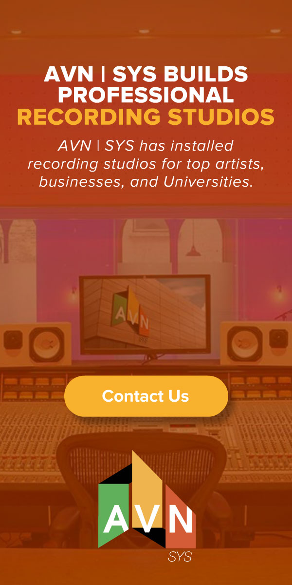 AVN | SYS display ad headlined 'Builds Professional Recording Studios,' noting studios installed for top artists, businesses, and universities, over an orange-toned control-room photo with the AVN logo.