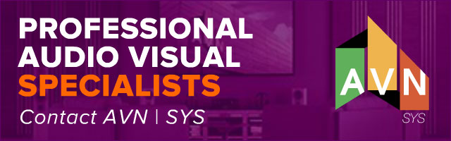 AVN | SYS 'Professional Audio Visual Specialists' display ad promoting audio, video, and technology installation for smart homes, offices, retail, restaurants, and recording studios, with the geometric AVN logo on a purple backdrop.