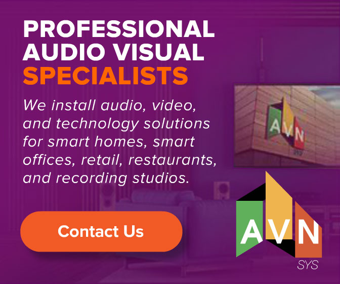 AVN | SYS 'Professional Audio Visual Specialists' display ad promoting audio, video, and technology installation for smart homes, offices, retail, restaurants, and recording studios, with the geometric AVN logo on a purple backdrop.