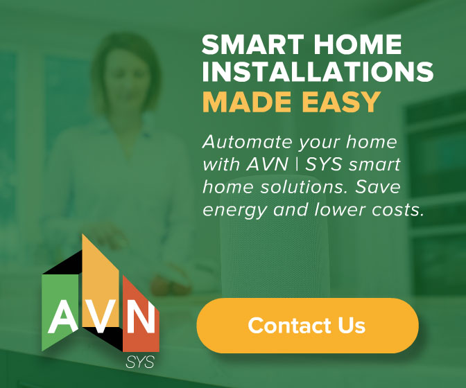 AVN | SYS 'Smart Home Installations Made Easy' display ad promoting whole-home automation, set on a green modern-kitchen backdrop with the AVN logo in a mirrored, right-aligned layout.