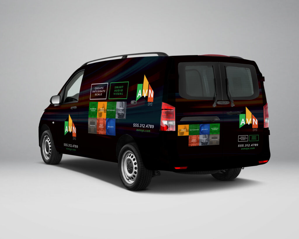 Rear three-quarter view of the AVN | SYS service van wrap, showing the branded side panel and rear doors with the logo, service-category tiles, and contact details.