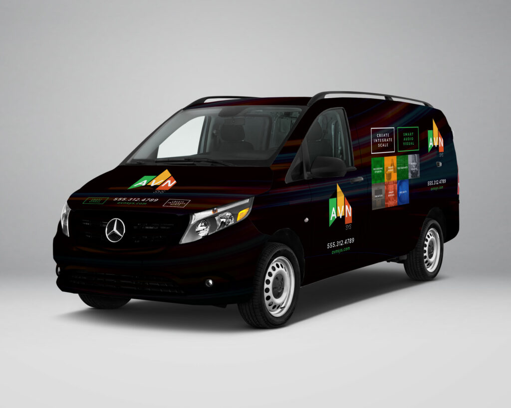 Front three-quarter view of the wrapped AVN | SYS Mercedes service van, showing the hood, branded side panel, logo, and contact details.