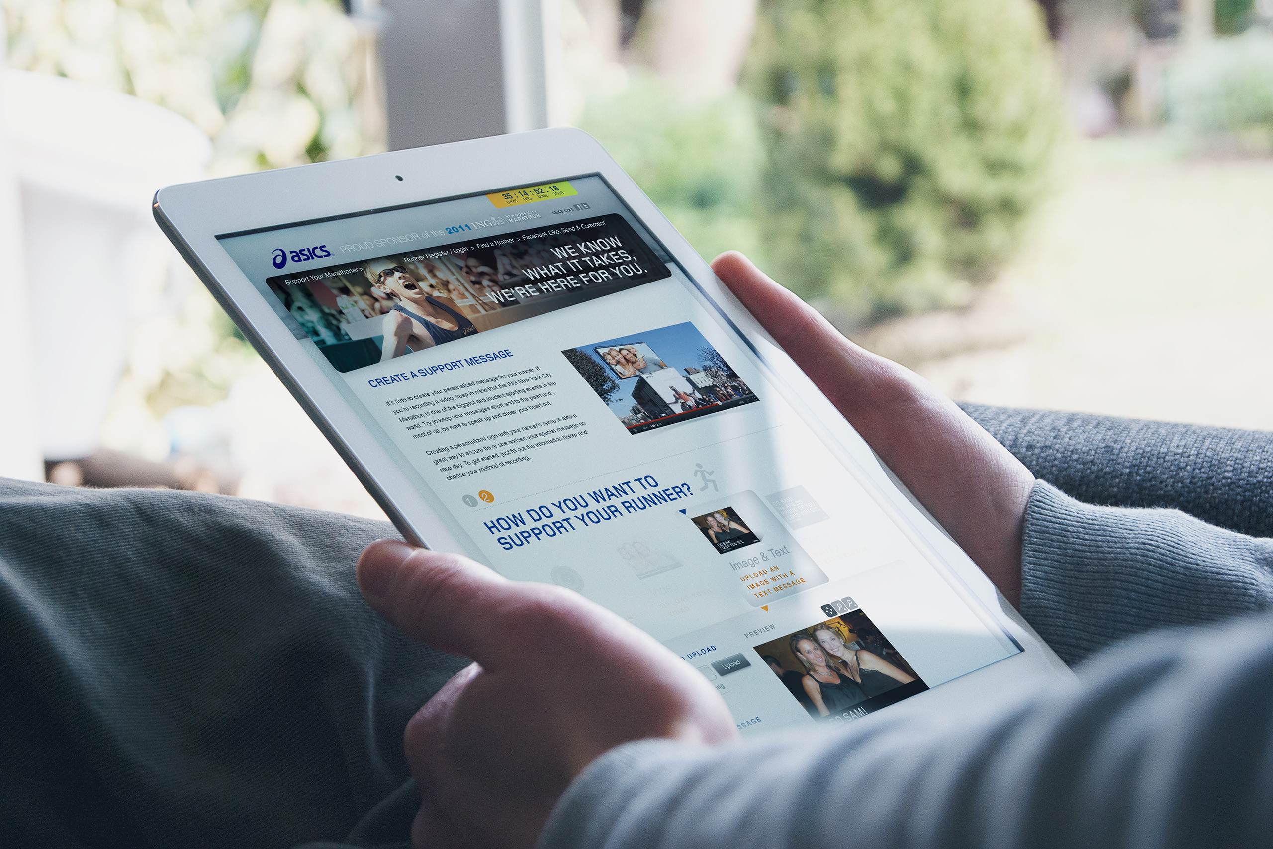 Tablet on a couch showing the create-a-support-message page with photo upload options under the We Know What It Takes banner.
