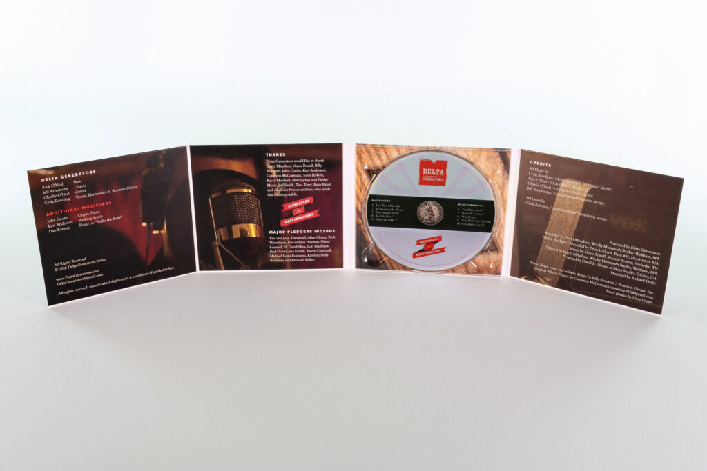 Fully opened gatefold showing credits, a vintage ribbon microphone photograph, and the disc seated in a woodgrain tray panel.