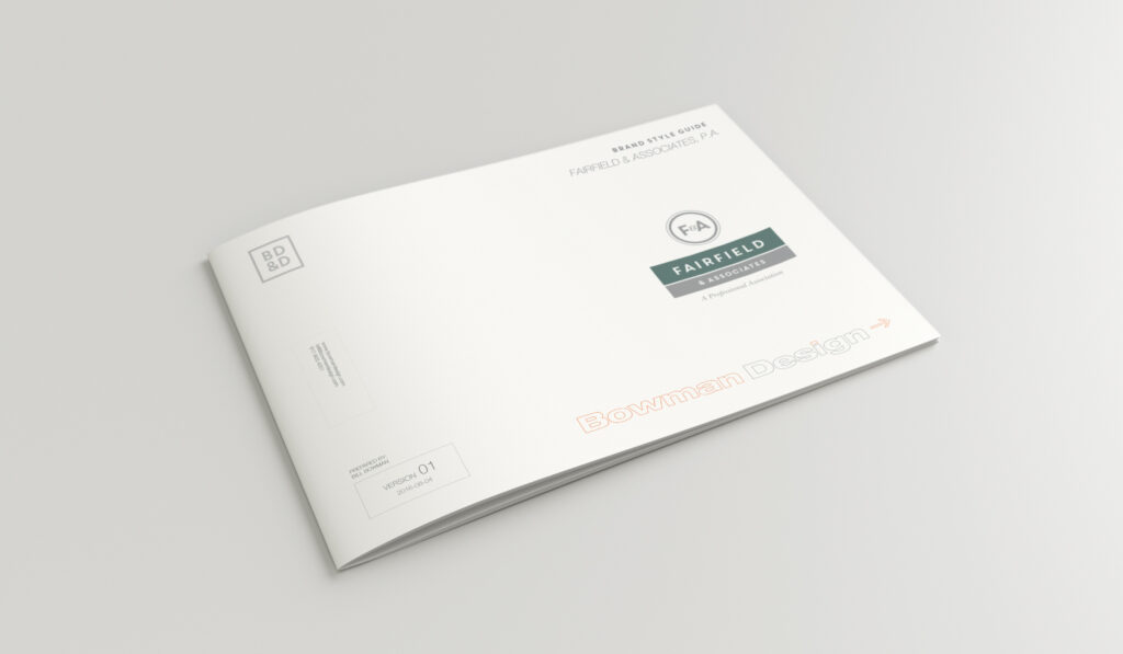 Fairfield & Associates brand style guide cover mockup, the F&A seal and stacked wordmark centered on a clean white landscape document.