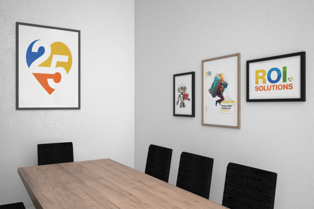 Virtual meeting backdrop of a meeting room wall with the framed 25 heart and small framed character prints.