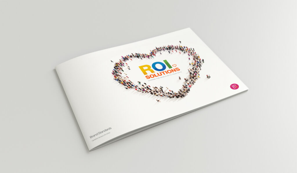Landscape standards book cover with hundreds of tiny figures forming a heart around the multicolor logotype.