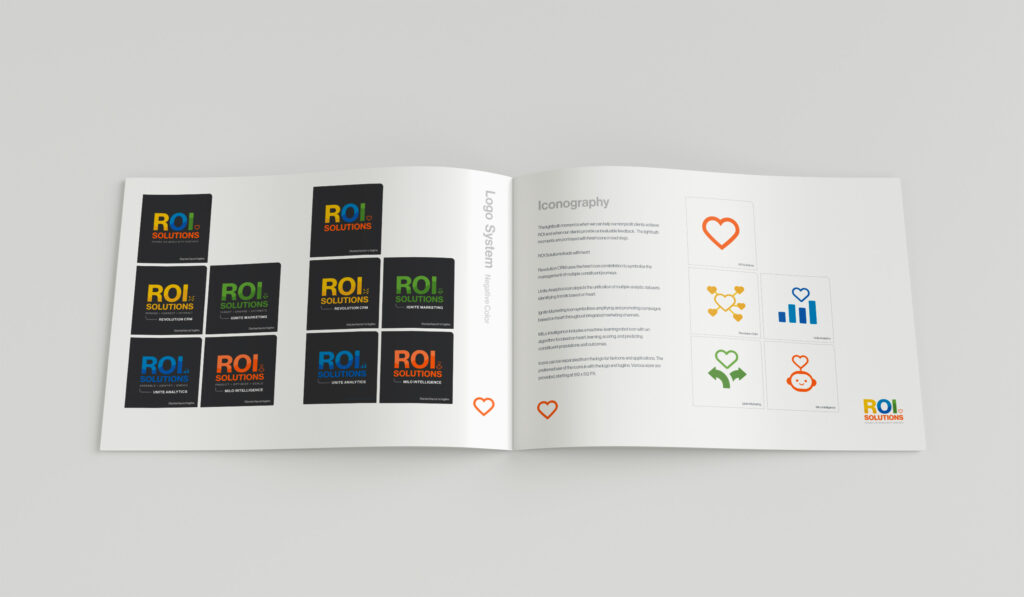 Spread showing reversed logo cards on black beside the iconography page of heart-based product glyphs.