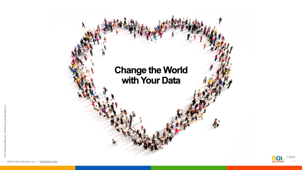 Slide of hundreds of people photographed from above forming a heart around Change the World with Your Data.