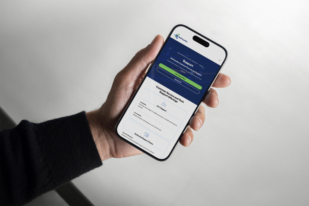 Hand holds a phone showing the Support page, customer service and tech support offerings listed beneath the navy header.