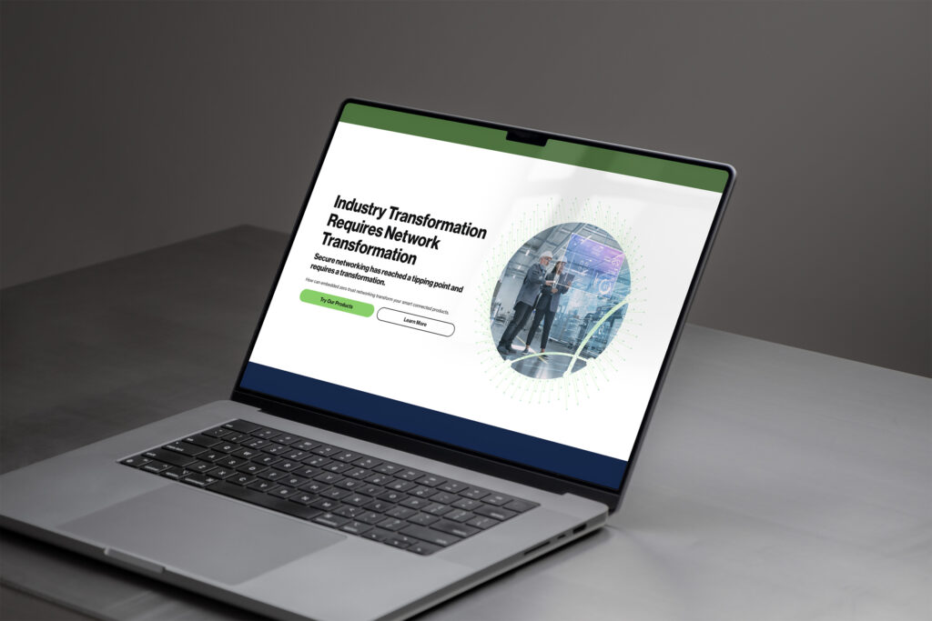 Laptop showing the Industry Transformation Requires Network Transformation hero, a skyline circle beside the green call-to-action.