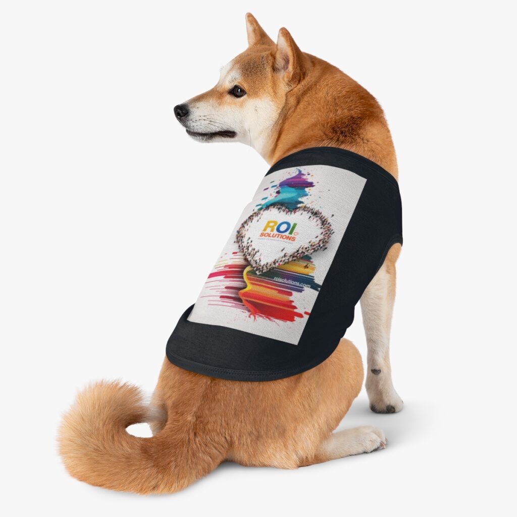 Shiba Inu wearing the black pet tank printed with the crowd heart over rainbow paint streaks.