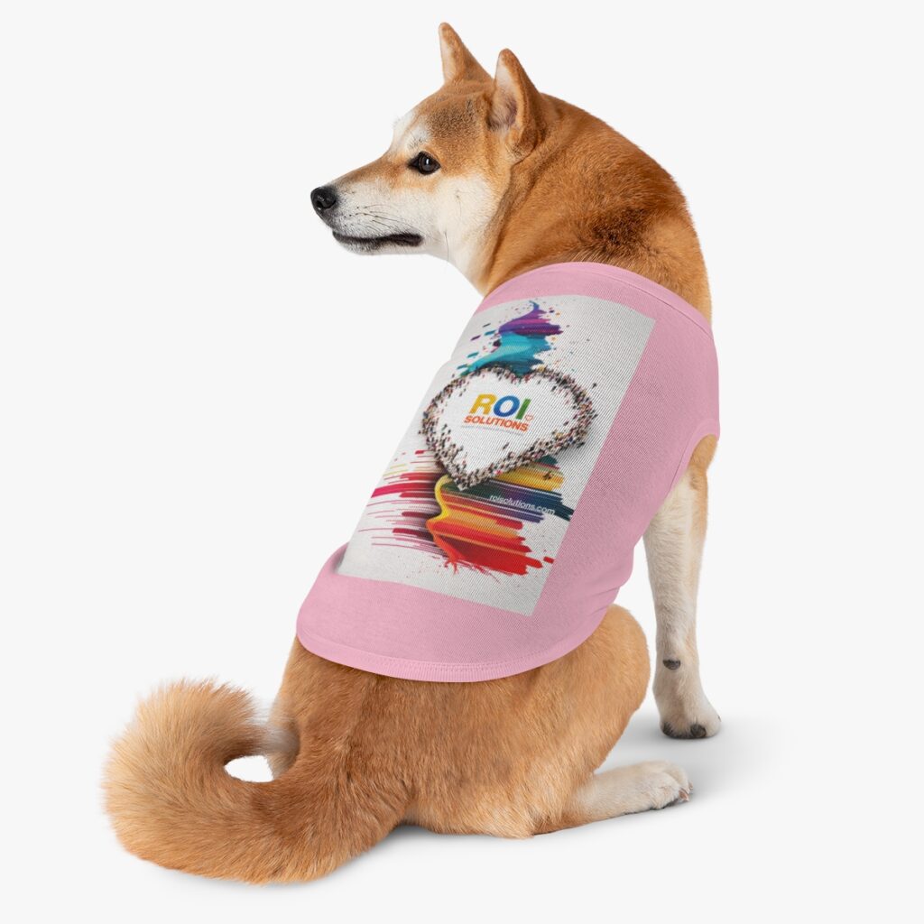 Shiba Inu wearing the pink pet tank printed with the crowd heart and rainbow paint streaks.