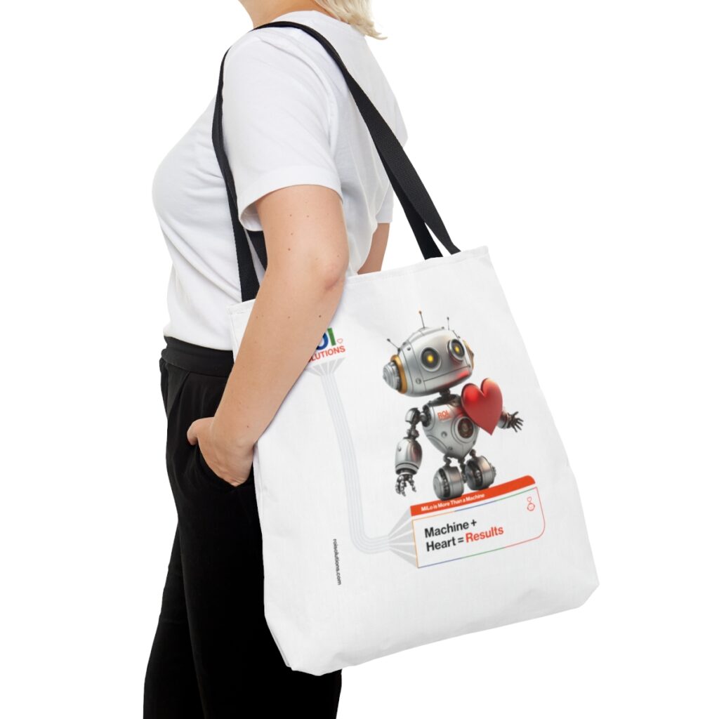 Side view of the MiLo heart tote on a shoulder, the robot and results line printed mid-panel.