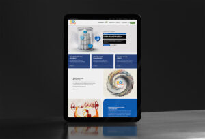Tablet showing the Unite Analytics page, the domed data city hero above blue panels and the data cyclone illustration.