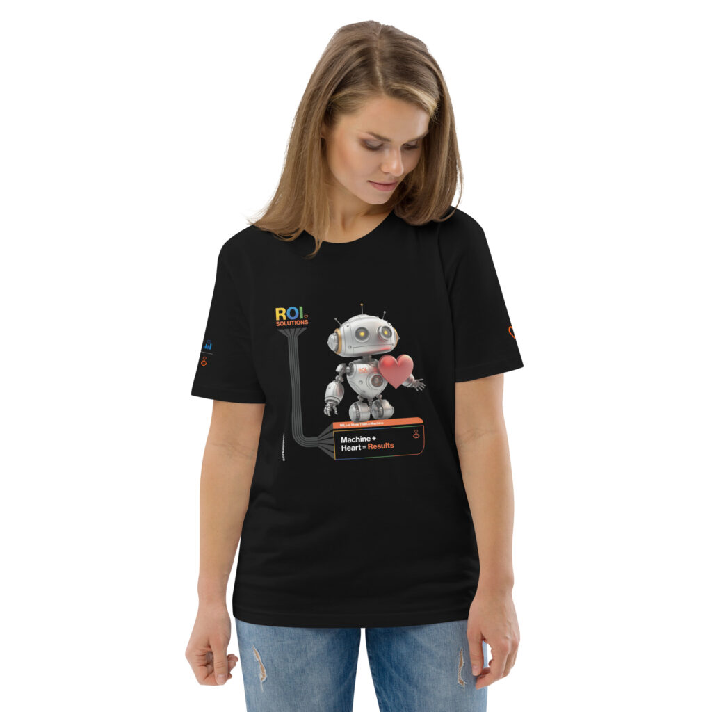 Model in the black tee printed with the silver robot hugging a red heart above the results line.