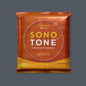 SonoTone Classic 09-42 nickel steel electric guitar strings in the burnt-orange vacuum-sealed foil pack, centered on a charcoal gray background.